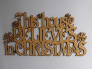 this_house_believes_in_christmas_snowflakes_hanging
