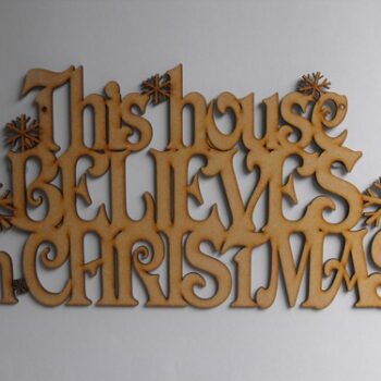 this_house_believes_in_christmas_snowflakes_hanging
