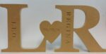 joined_initials_with_heart_and_engraving