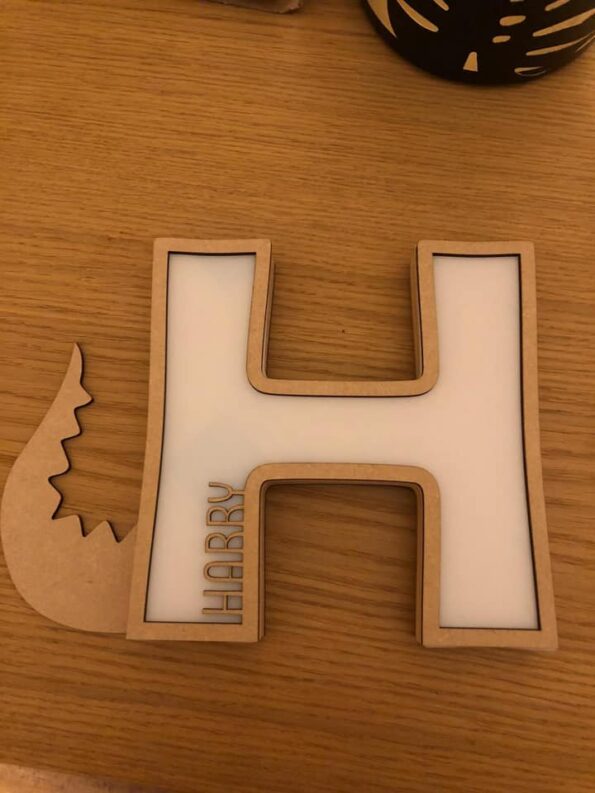 dinsaur tail letter